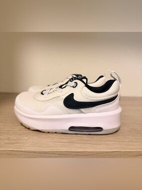 Nike Kids White Sneakers with Black Swoosh